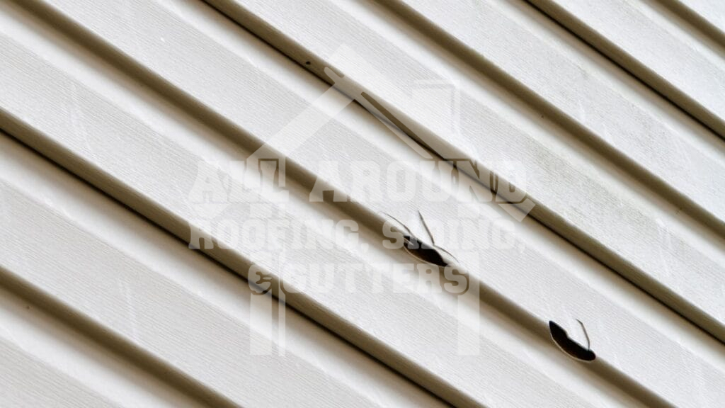 Bad Roofing Job Broken or damaged siding