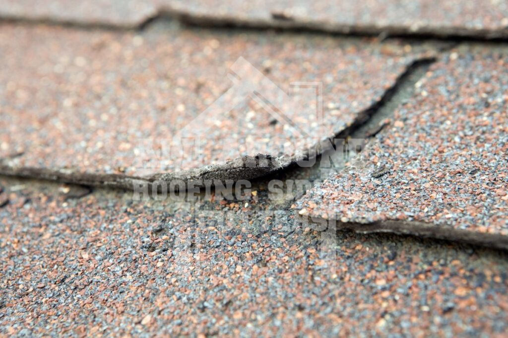 Shingle Damage From Hot Roof Cracks and brittleness shingle