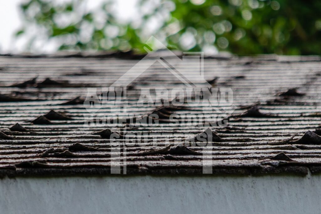 Shingle Damage From Hot Roof Curling shingles